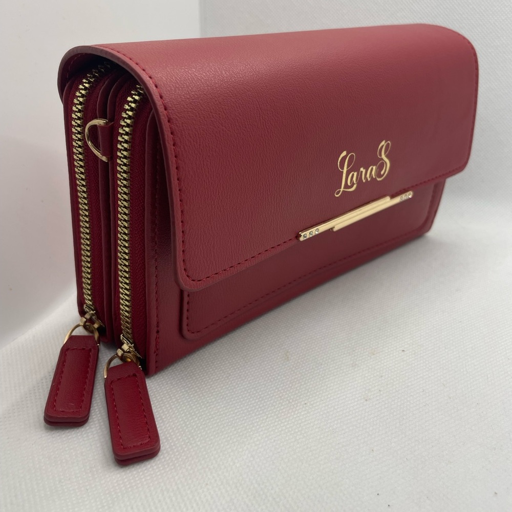 Double zipper, coin pocket, snap shut clutch comes with removable shoulder strap